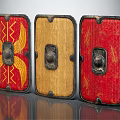 Three Decorative Shields Featuring Red Yellow Patterns Wooden Panel And Red Black Metal Accents