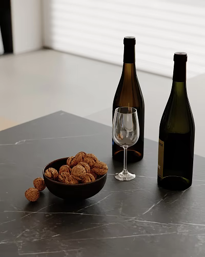 Decorative Ornament Set Including Walnuts Bowl Wine Bottles and Wine Glass on Black Marble Tabletop 3d model