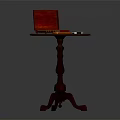 Classic Dark Brown Wooden Round Accent Table With Three Legs And Red Box On Top