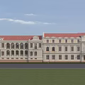 European Style Building Exterior with Cream Exterior Red Roof Clock Tower Front Lawn and White Car