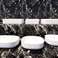 Three Elegant Modern White Washbasins on Black Marble Bathroom Countertop
