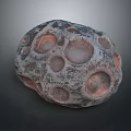 Rustic Natural Stone And Wood Art Piece With Circular Indentations And Textured Surface