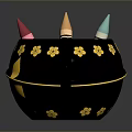 Black Mug With Gold Flower Decorations And Colorful Crayons Inside
