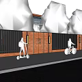 Red Brick Exterior Wall with Black Metal Fences People Walking Riding Scooter Bicycle Trees Water