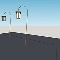 Classic Lantern Style Outdoor Lights Mounted On Curved Poles Against Blue Sky