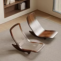 Modern Wooden Rocking Chairs With Mesh Design On Neutral Rug In Living Room