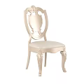 Elegant Light Colored European Style Dining Chair With Carved Details And Upholstered Seat