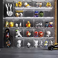 Toy Figurines Collection on Transparent Acrylic Shelf with Various Styles and Colors