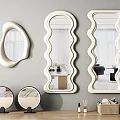 Decorative Wavy And Irregular Wall Mirrors With Small Round Mirrors On Wooden Table Top