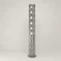 Modern Silver Metal Floor Lamp With Cylindrical Stacked Hollow Design In Minimalist Interior