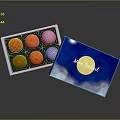 Six Colorful Round Mid-Autumn Mooncakes in Open Blue Gift Box with Moon Cloud Patterns