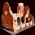 Ancient Red Brick Ruined Building With Arched Doorways Circular Window And Tower Structure
