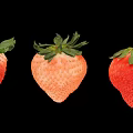 Fresh Ripe Juicy Strawberries Two Whole Red And One Sliced Half On Black Background