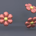 Three Pink Inflatable Flowers With Yellow Centers And Pink Petals Design