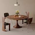 Round Wooden Dining Table And Chairs With Unique Base Flower Vase And Modern Pendant Light