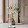 Brown Glass Vase With Green Leafy Branches In Modern Indoor Decor With Soft Lighting