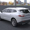 White Buick SUV Exterior With Modern Front Grille And Sleek Body Lines