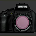Fujifilm Black Camera Body With Pink Filter Lens On Reflective Surface