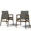 Two Modern Armchairs With Checkered Pattern And Wooden Frame In White Background