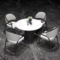 Modern Round Dining Table With White Marble Top And Light Gray Upholstered Chairs