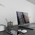 Modern Workspace Desk With Laptop Smartphone Wireless Earbuds Pen Holder And Green Plant