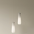 Two White Slender Cone Shaped Pendant Lights With Silver Base On Beige Wall 3d model