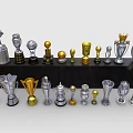 Various Gold and Silver Trophies Medals Display with Different Styles and Designs