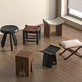 Various Modern Minimalist Wooden Stools With Different Designs And Colors On Wooden Floor