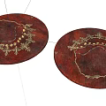 Gold Jewelry Pieces With Decorative Patterns And Beads On Round Wooden Trays