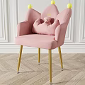 Cute Pink Upholstered Dining Chair With Golden Legs And Yellow Pom Poms On Backrest