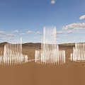 Tall White Glass Desert Fountain Structures Under Blue Sky With Clouds And Distant Mountains