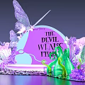 Purple Themed Floral Installation With Butterflies For The Devil Wears Prada Event Decor