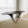 Elegant Black Oval Dining Table With Unique Curved Base And White Curtains On Wooden Floor