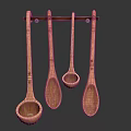 Four Decorative Wooden Spoons Hanging On Wall Mounted Rack For Kitchen Utensil Storage And