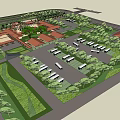 Aerial View of Building Complex With Red Roofs Plaza Trees and Parking Lot