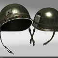 Two Old Green Helmets With Colorful Decorative Straps And Small Bottle