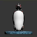 Decorative Penguin Figurine With Blue Ice Base And Black White Red Details