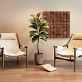 Two Light Leather Lounge Chairs With Wooden Legs And Green Plant On Wooden Floor
