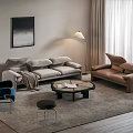 Modern Living Room Interior With Gray Sofa Brown Armchair Blue Chair Floor Lamp And Rug