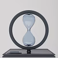 Modern Decorative Ornament Set With Circular Frame Hourglasses And Black Bases