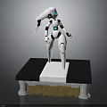 White Robot Character Standing On Black Base With Golden KORBOTRON Letters