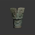 Ancient Bronze Beast Mask Sculpture Carving Featuring Symmetric Patterns And Greenish Patina