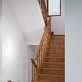 Classic Wooden Staircase Interior with Handrail Steps and White Walls Design