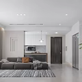 Minimalist Living and Dining Room Interior With Gray Sofa Open Kitchen And Pendant Lights
