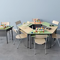 Children's Desks With Green And Beige Surfaces Building Blocks And Toy Cars