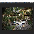 Cozy Garden Courtyard With Outdoor Sofa Colorful Pillows Lush Green Plants And Pebble Flooring