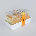 Fresh Rolled Bread in White Container With Transparent Lid and Orange Label