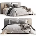 Cozy Modern Double Bed With Soft Gray Comforter Dark Blanket And Upholstered Headboard