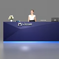 Exhibition Reception Desk With Dark Blue Design White Flowers Laptop And Female Staff