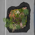 Art Installation Featuring Black Stone Container With Green Plants And Colorful Flowers